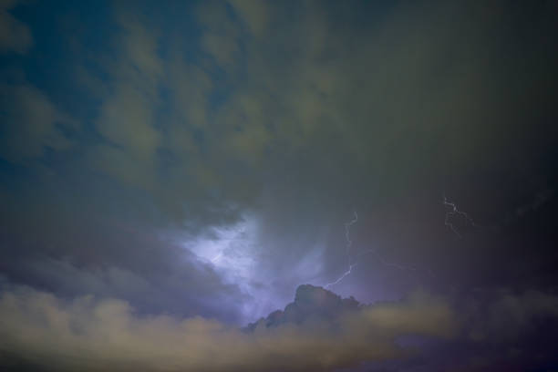 istock Stroke of lightning with storm clouds 953707308