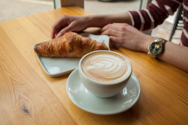 istock Morning cup of coffee and croissant. 953712918