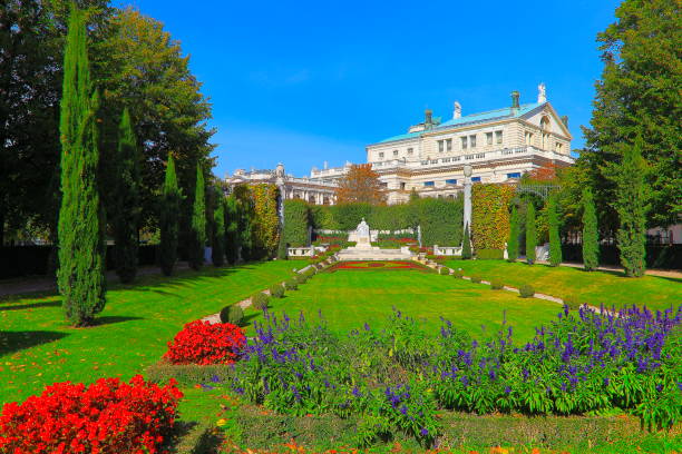 Ornamental garden and flowerbed in Stadtpark, Vienna central public park Ornamental garden and flowerbed in Stadtpark, Vienna central public park burgtheater vienna stock pictures, royalty-free photos & images