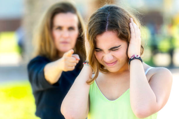istock Mature mother scolding her young daughter 953714566