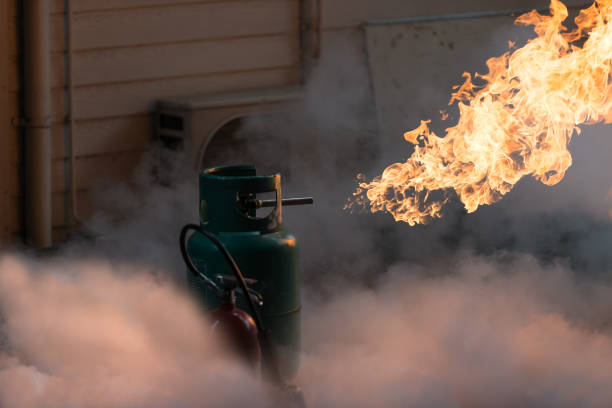 Fire Fighter training Gas tanks with fire. during training flammable photos stock pictures, royalty-free photos & images