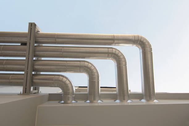 istock Aluminum ventilation air Pipes in building. 953722100