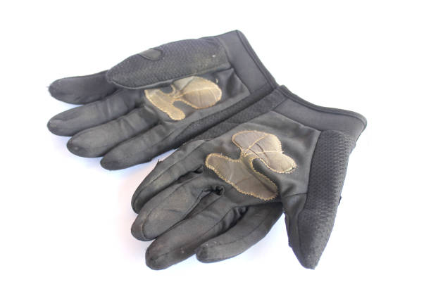 istock dirty old black gloves. 953722258