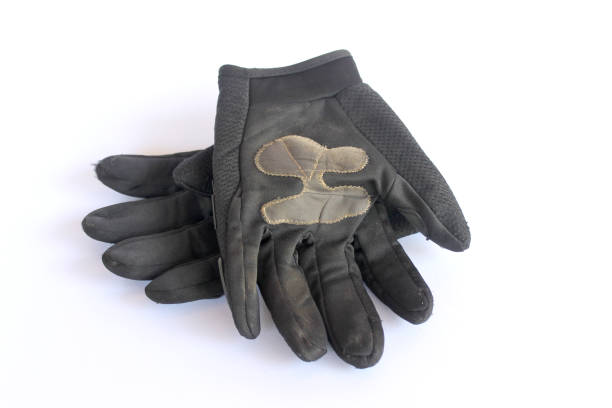 istock dirty old black gloves. 953722296