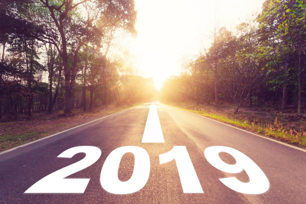 istock Empty asphalt road and New year 2018 concept. Driving on an empty road to Goals 2018. 953722806