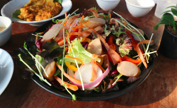 istock sausage and vegetable salad or mixed salad 953723706