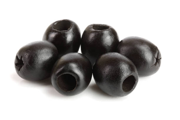 istock whole black olives isolated on white background macro 953729352