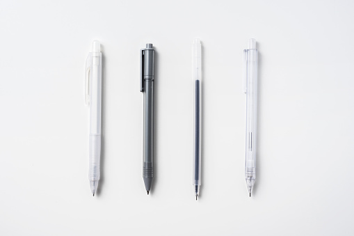 Top view of collection of mechanical pencil  on white background desk for mockup