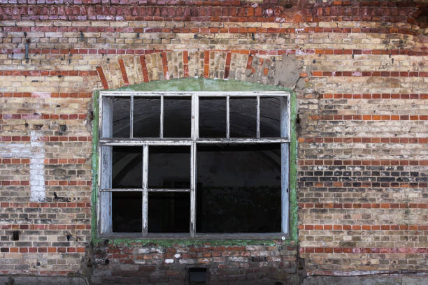 istock window in a very old red brick fortress 953738480