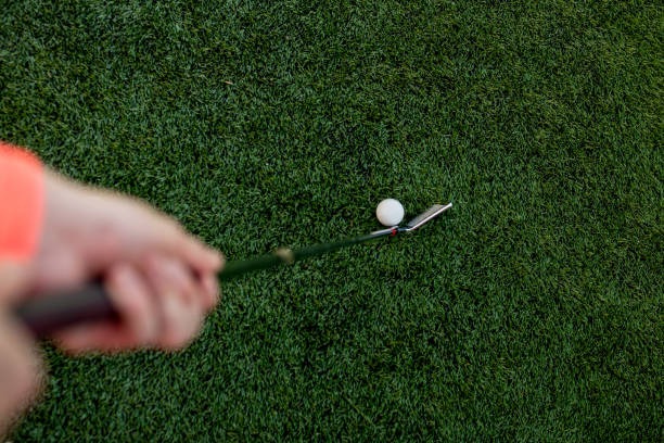 istock Golf stick and ball on green grass 953741090