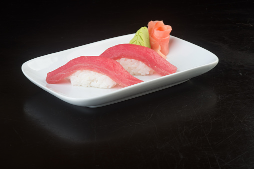 japanese cuisine. sushi tuna on background