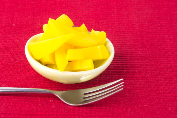 istock preserved mango fruits Snack on Background 953745806