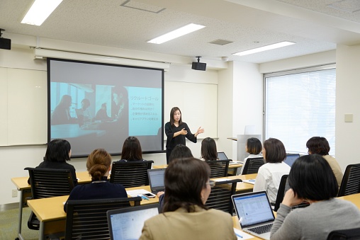 Young business woman giving a presentation in Japan