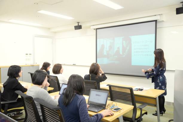 istock Young business woman giving a presentation 953747382