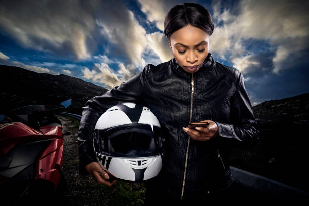istock Female Biker Looking at GPS 953747908