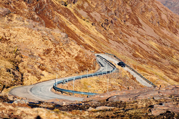 Bealach na Ba, Applecross Peninsula, Scotland Looking down on the hairpin bends of the Bealach na Ba in Wester Ross, Scotland. applecross peninsula stock pictures, royalty-free photos & images