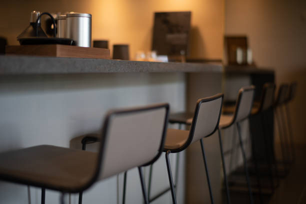 istock chairs in the dinning room line up together 953753040