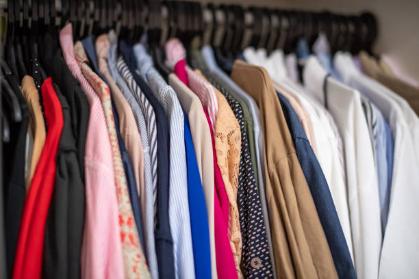 istock clothes hanging in the closet 953754366
