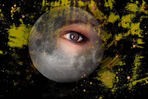 istock Space and the moon, eyes with clock, other reality 953756912