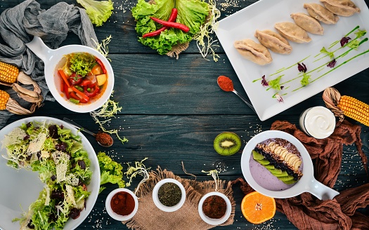 Dinner. A set of food. On a wooden background. Top view. Copy space.