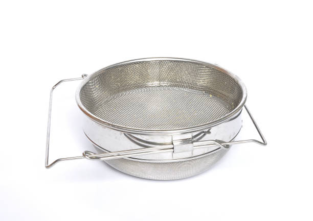istock Honey sieve stainless steel on white 953761966
