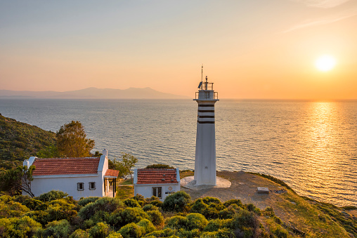 Sarpincik Lighthouse view at sunset in Turkey