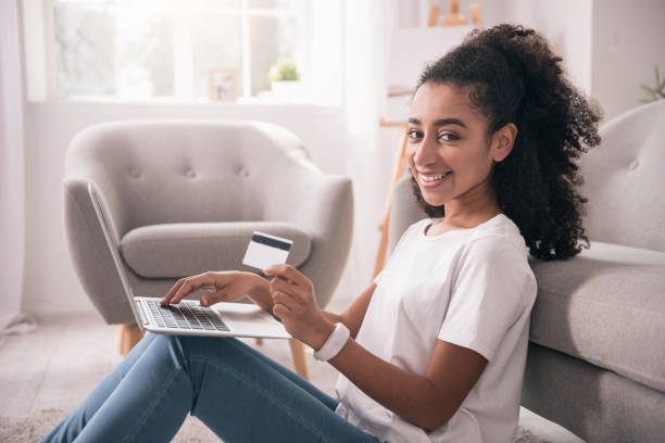 istock Cheerful happy woman using Internet banking 953764908