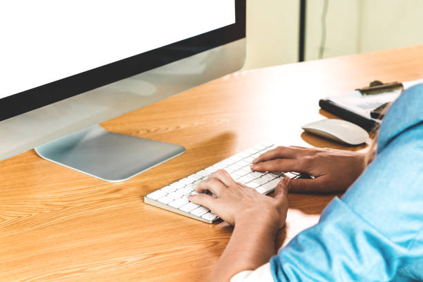 istock Businesswoman working with computer and typing text on keyboard at modern office 953769468