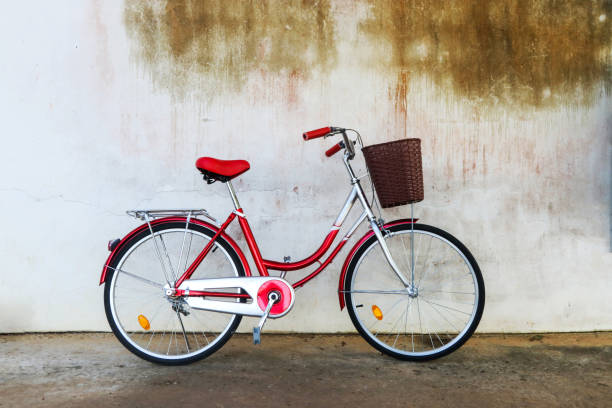 istock New bicycle at old vintage wall. 953771966