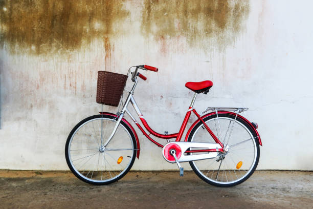 istock New bicycle at old vintage wall. 953772016