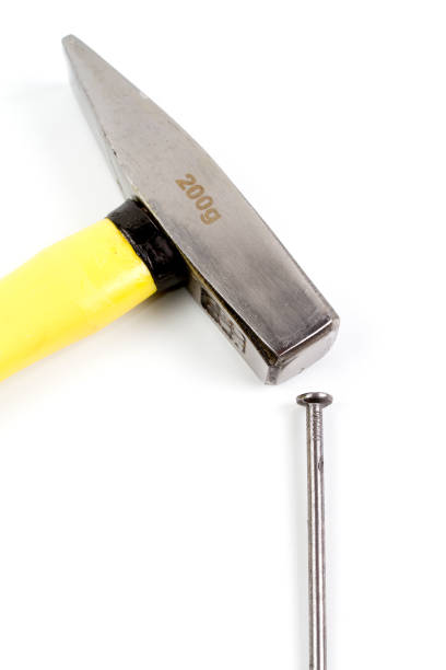 istock Small metal cross peen hammer with yellow plastic cover handle. 953772228