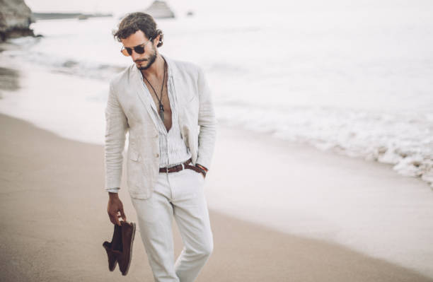 istock Enjoying a walk on the beach 953773278
