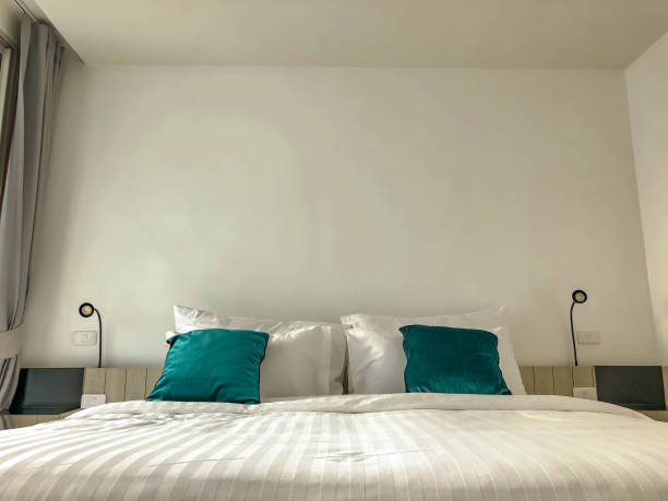 istock new modern bedroom,white blankets, pillows 953774008