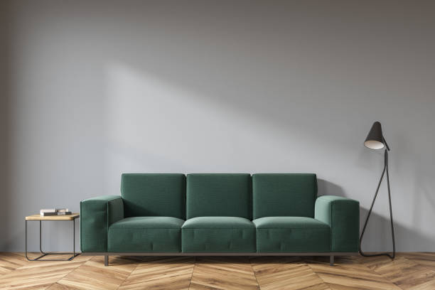 istock Gray living room, dark green sofa 953775376