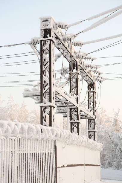 istock Glass insulator on the power line. Insulator of electrical high-voltage lines 953790526