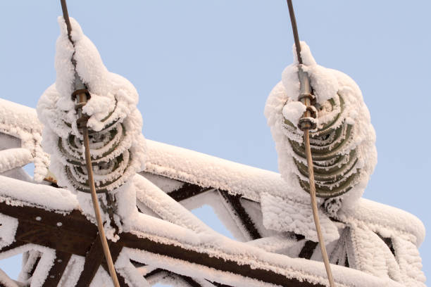 istock Glass insulator on the power line. Insulator of electrical high-voltage lines 953790602