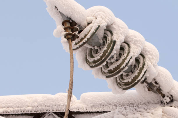 istock Glass insulator on the power line. Insulator of electrical high-voltage lines 953790612