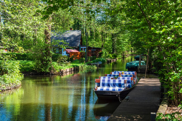 Landscape with barge in the Spreewald area, Germany.