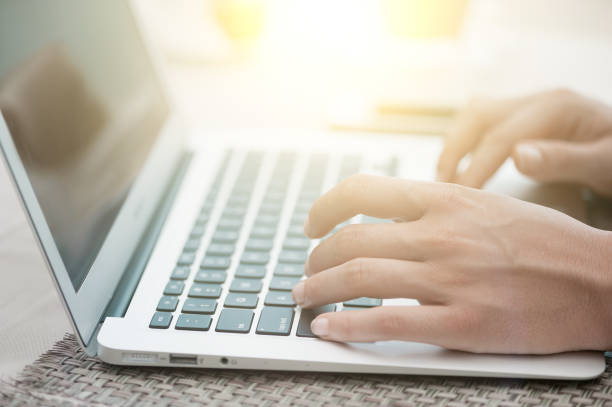 istock Happy woman using laptop at cafe. Close-up view 953793012