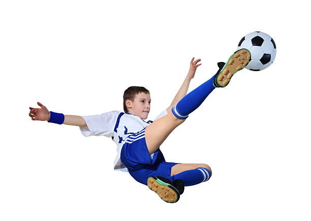 Boy with soccer ball stock photo