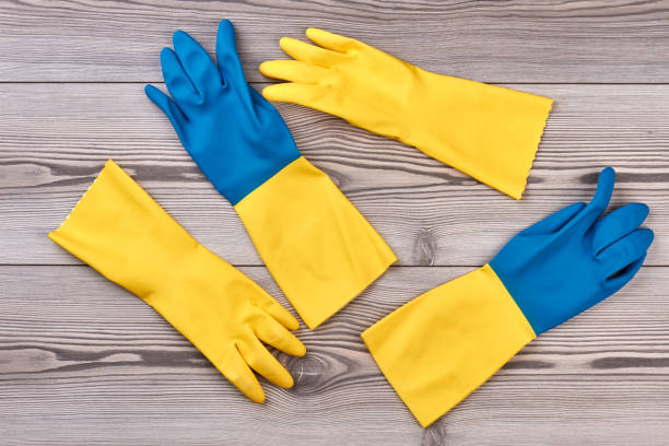 istock Yellow and blue rubber gloves. 953795504