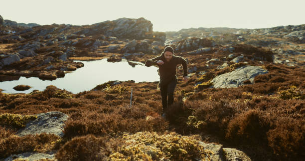 istock Adventures of a man hiking on the mountain 953796456