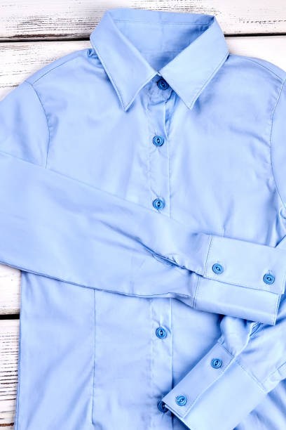istock Modern light blue woman shirt. 953800814