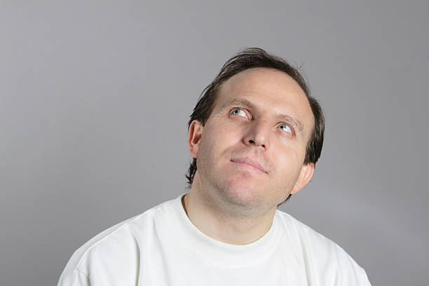 man portret in white casual wear stock photo