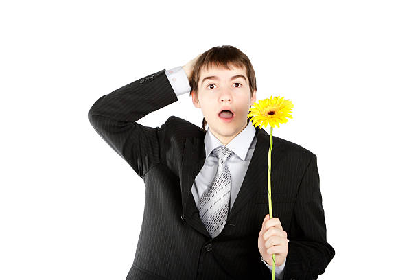 boy with a gift on the white background stock photo