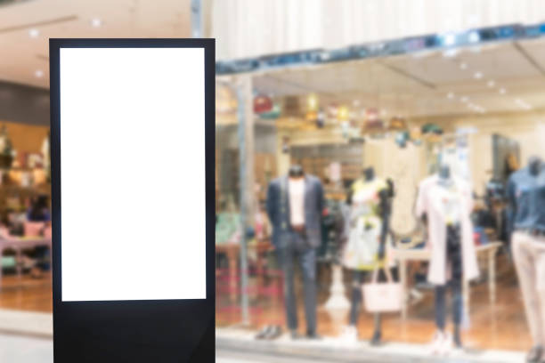 istock Blank billboard with copy space for your text message or content in shopping mall and luxury clothing derpartment store for background 953811360