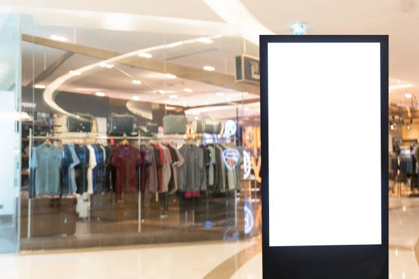 istock Blank billboard with copy space for your text message or content in shopping mall and luxury clothing derpartment store for background 953814276