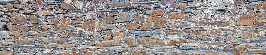 old rocks in a wall of a castle