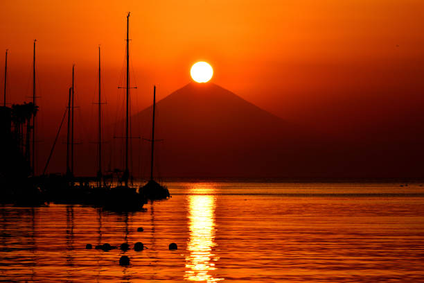 A little motor boat at sunset in Sicily