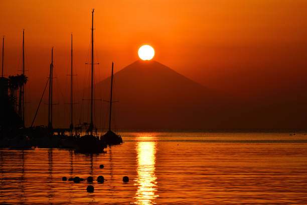 These photos of sunset over Mt Fuji and after sunset were taken at Moroiso Bay, Miura City, Kanagawa Prefecture. Moroiso Bay is located at the tip of Miura Peninsula.Mt Fuji is designated as UNESCO World Heritage site.